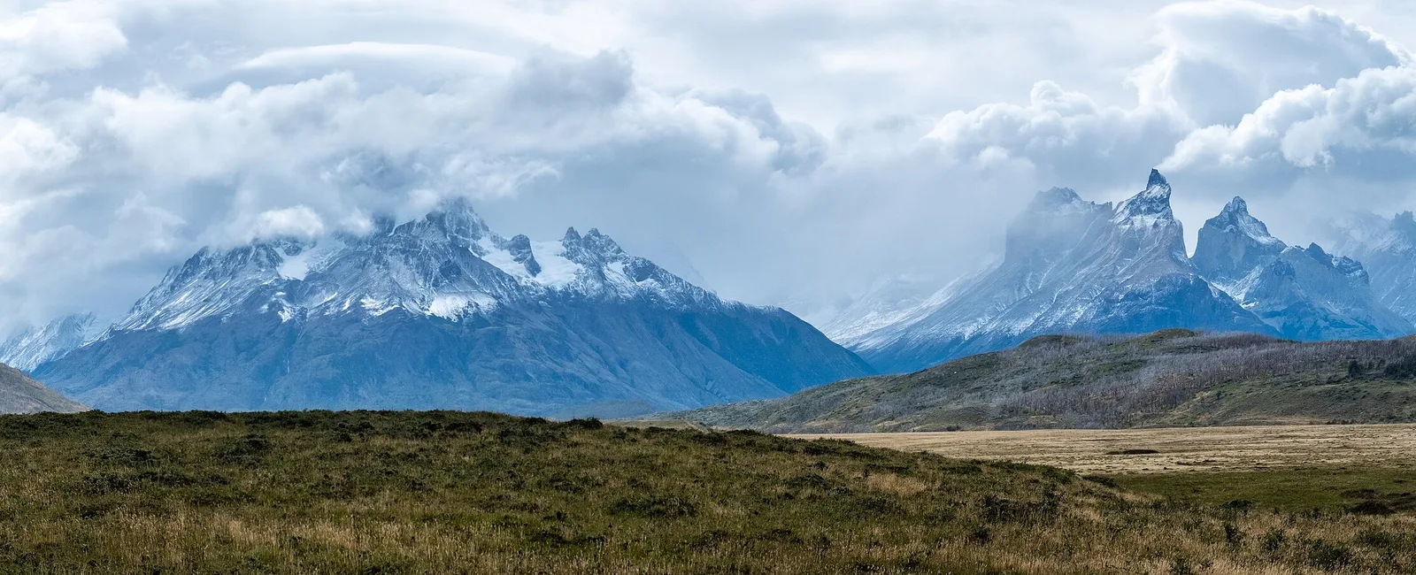 A wide view of lakes, steppe, and granite peaks in Torres del Paine